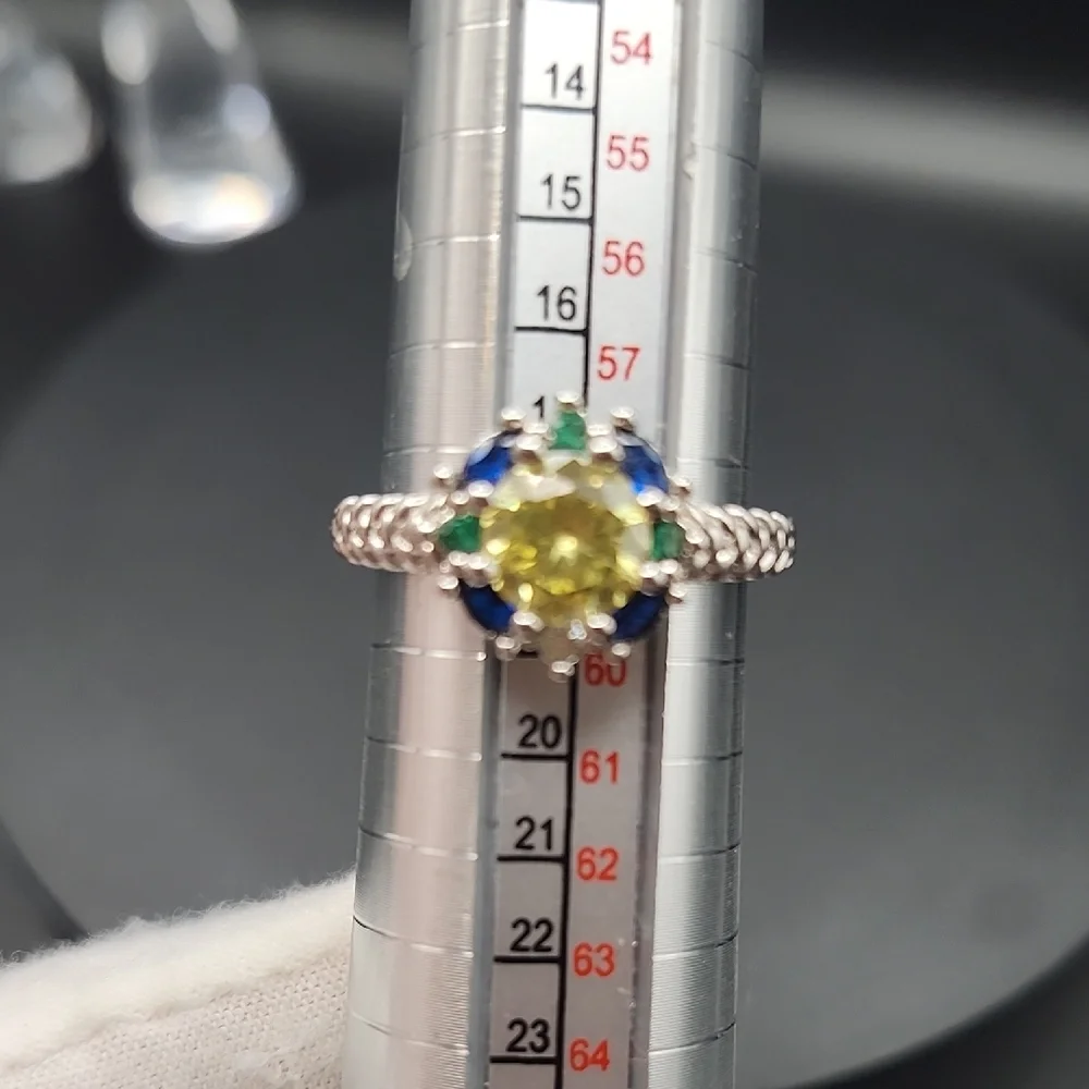 Elegant Silver Ring with Yellow and Blue Stones